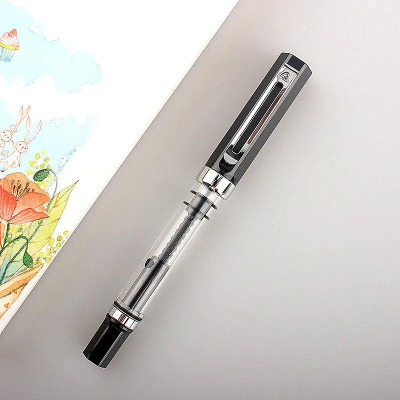 Stylo-plume transparent, remplissage à piston, pointe 0,5 mm