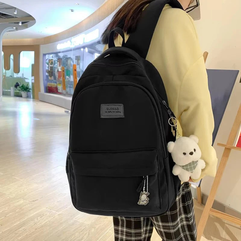 Sac à dos universitaire imperméable de 35 L, design unisexe et grande capacité