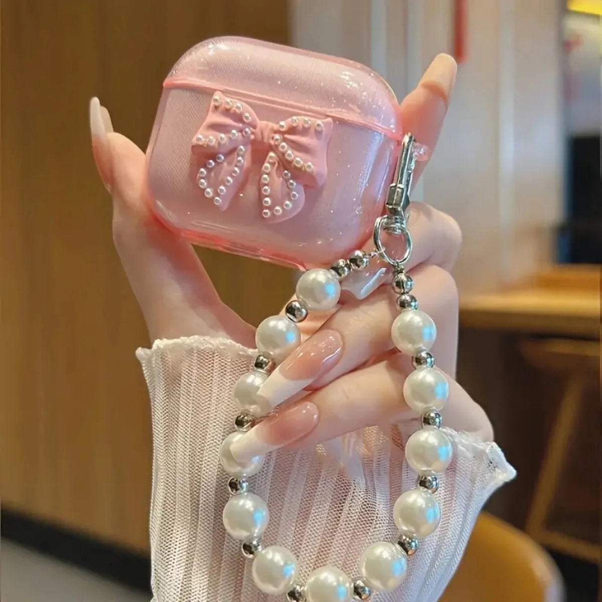 Cover protettivo glitter con fiocco cristallo per AirPods Pro e AirPods