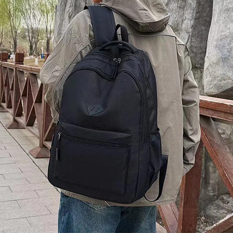 Nouveau sac à dos noir tendance, sac décontracté pour l'école, les trajets quotidiens, les sorties en plein air et les cadeaux de festival