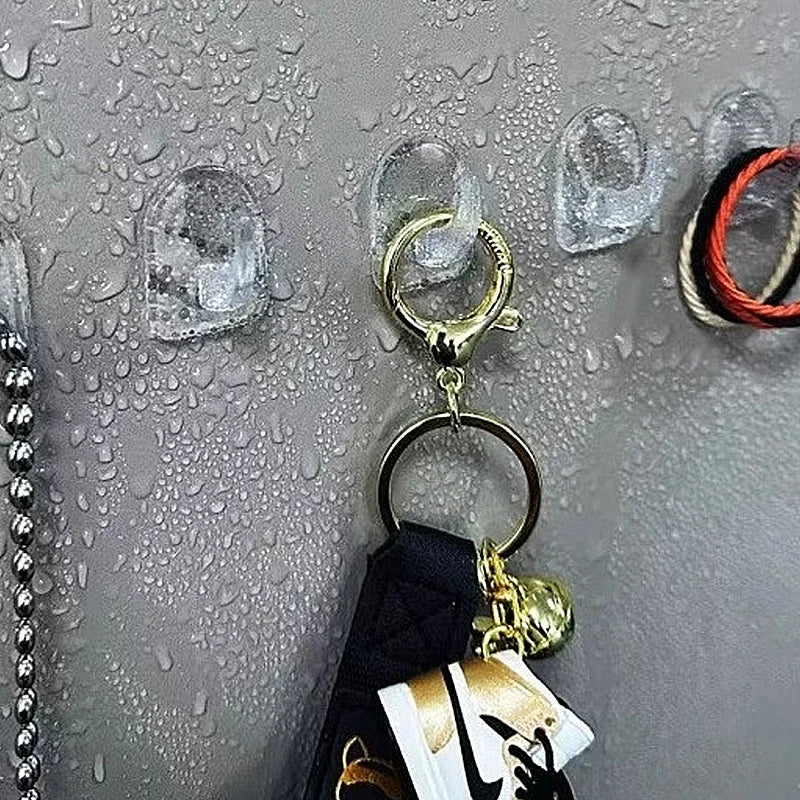 Ganci adesivi trasparenti mini – carico, impermeabili, multiuso