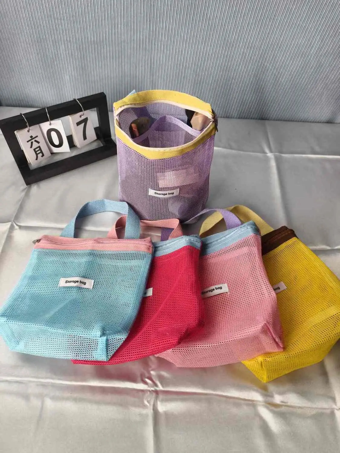 Borsa cosmetica pieghevole in rete, colore vivace, tascabile da spiaggia