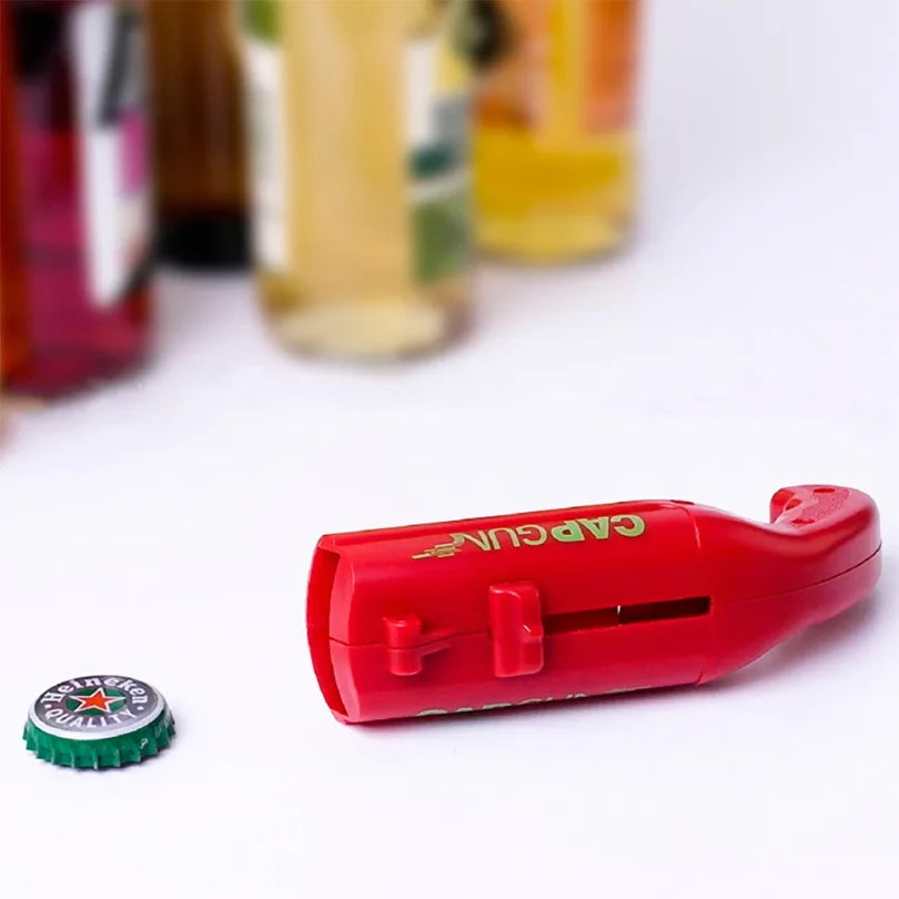 Apribottiglie pistola con lanciatore tappi – portatile e divertente