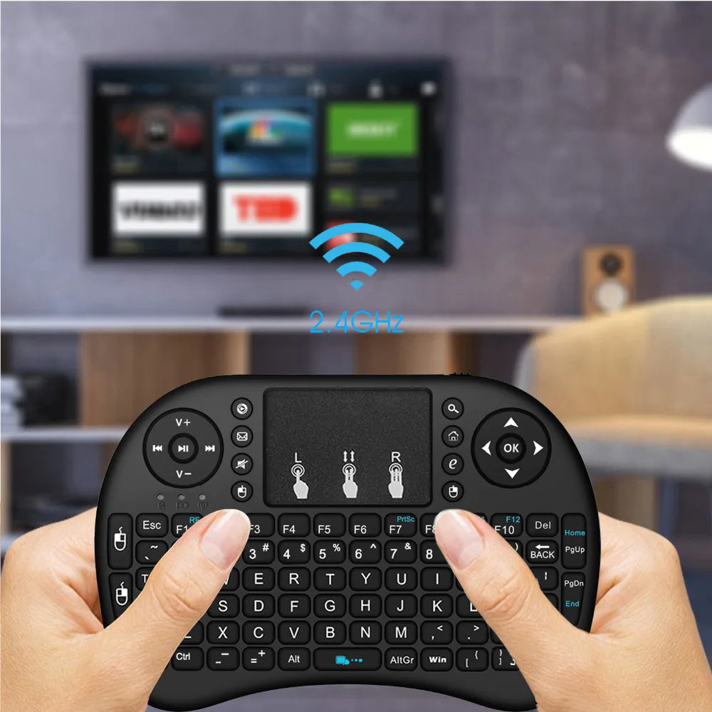 Tastiera mini wireless retroilluminata con touchpad e supporto multilingua