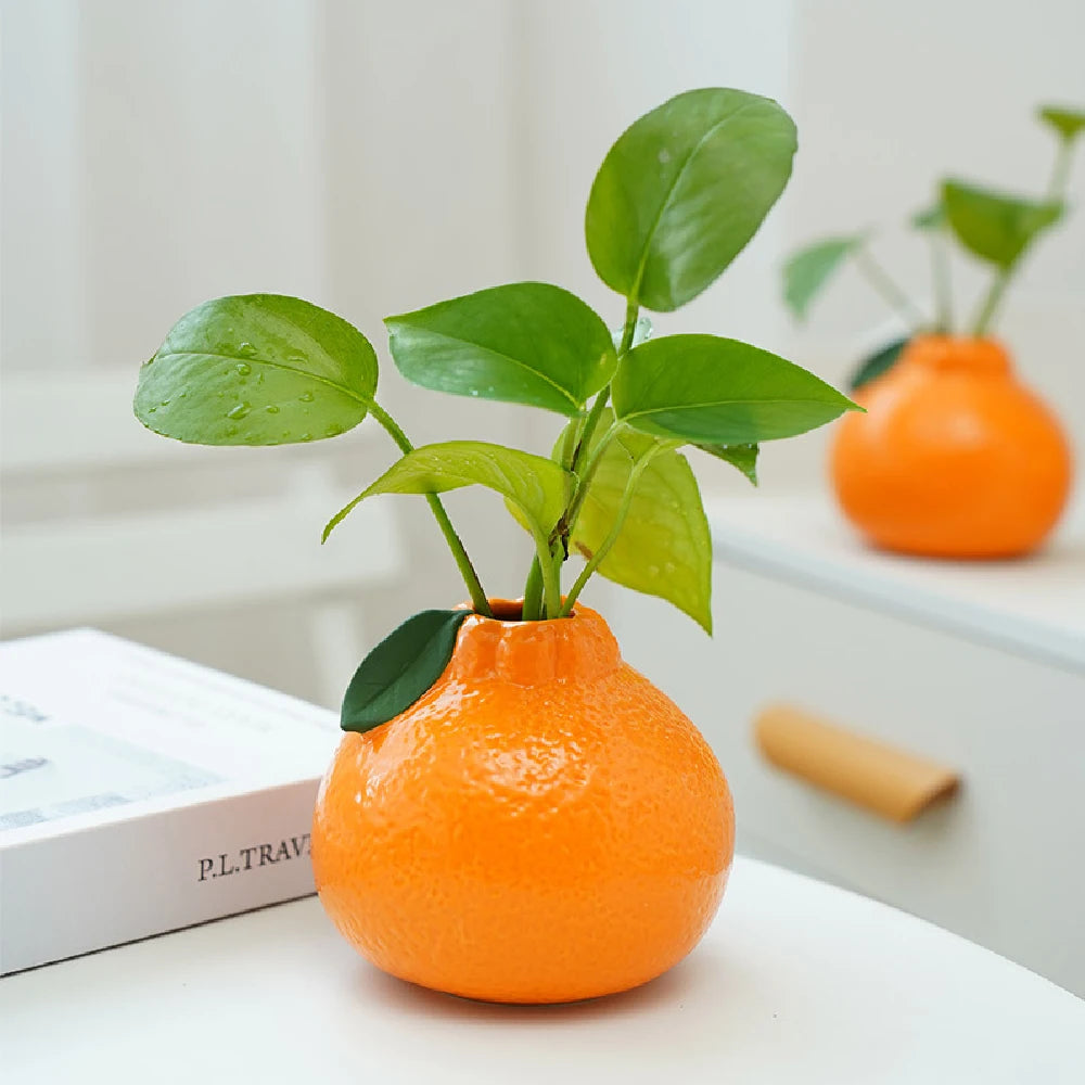 Vaso in ceramica arancione a forma di frutta – decorazione tavolo elegante