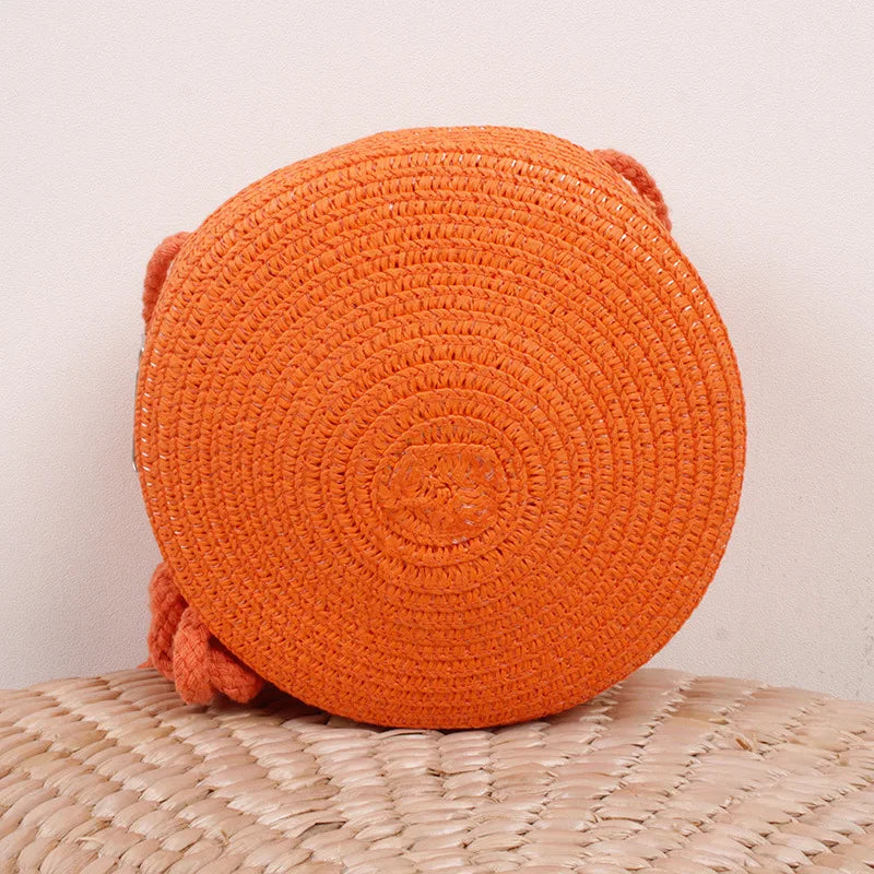 Borsa a tracolla rotonda in paglia intrecciata – stile boho per donna