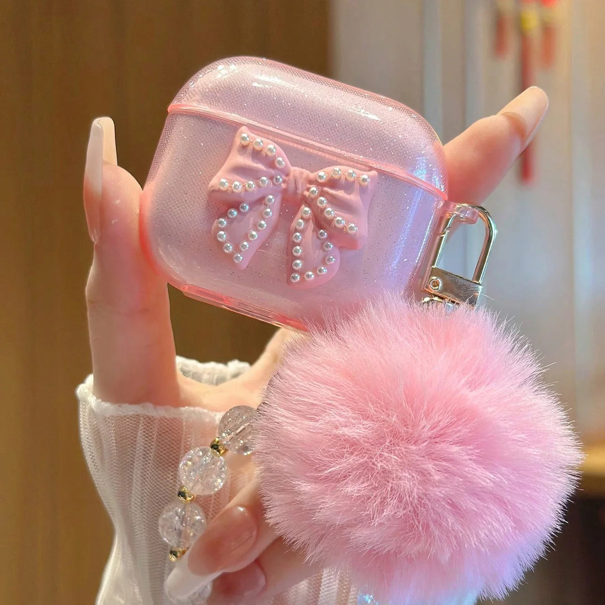 Cover protettivo glitter con fiocco cristallo per AirPods Pro e AirPods