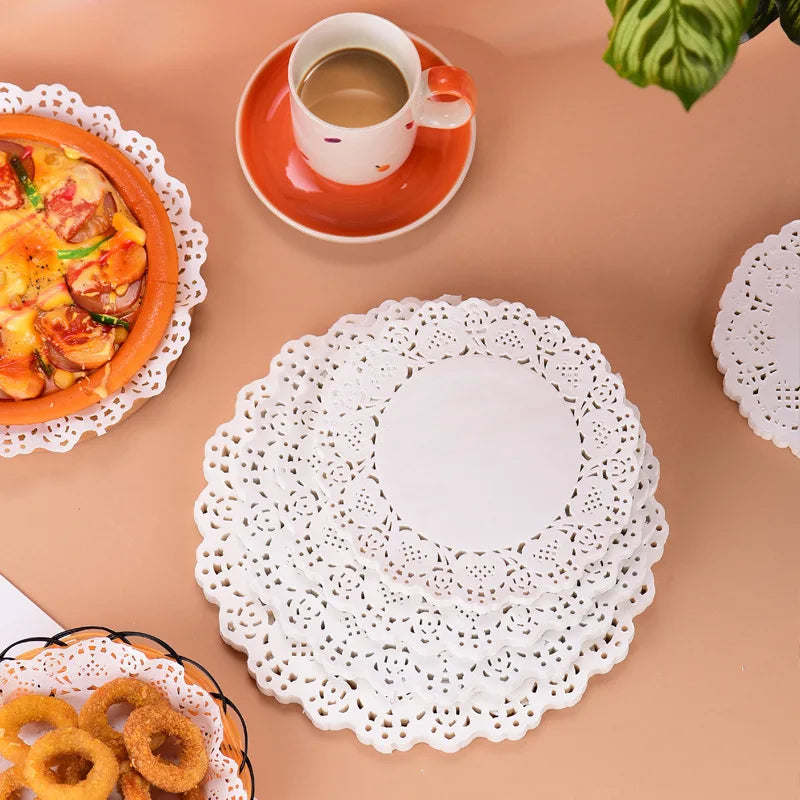 150 white lace paper placemats for table décor, weddings and events