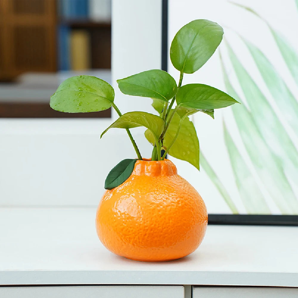 Vaso in ceramica arancione a forma di frutta – decorazione tavolo elegante